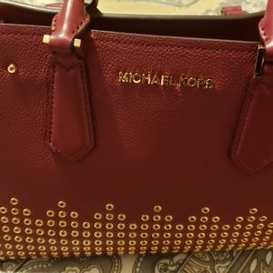 Michael Kore hand bag/ with strap